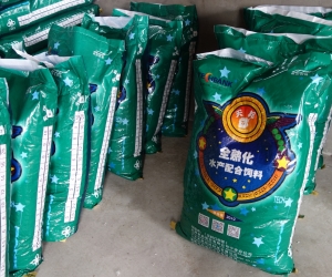 Specially formulated carp feed sits in bags at the IPRS site